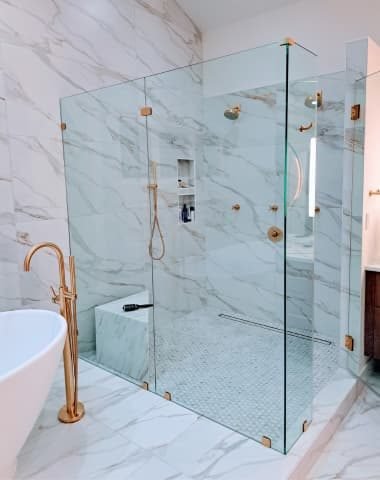 Luxury bathroom remodeling with glass shower and marble tile in Northern Virginia